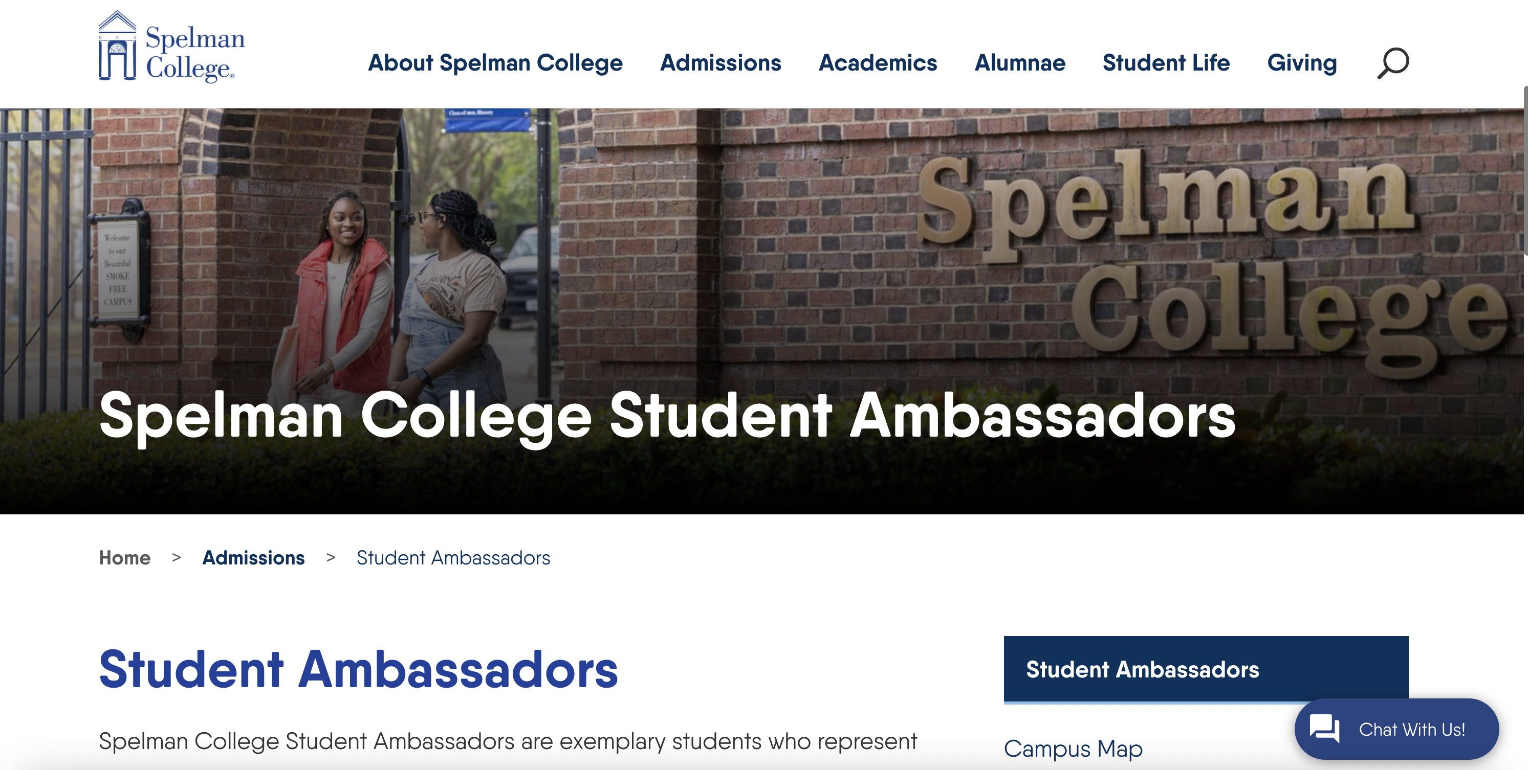 Spelman College logo with a promotional image of two student ambassadors standing in front of the college entrance.
