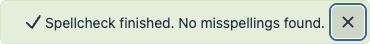 A success notification in the new editor reading Spellcheck finished, no misspellings found, with a visible focus ring around its dismiss button.